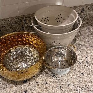 Set of Metal Colanders in Gold, Silver, and Cream